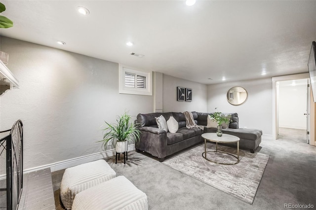 living area featuring recessed lighting, carpet flooring, visible vents, and baseboards