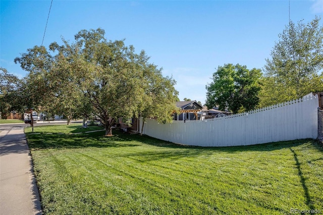 view of yard with fence