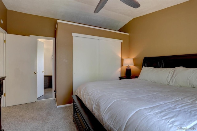 8745 W Ottawa Ave, Littleton, CO 80128 - carpeted bedroom with a closet, vaulted ceiling, and ceiling fan
