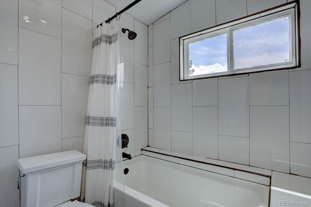 8745 W Ottawa Ave, Littleton, CO 80128 - bathroom with shower / tub combo and toilet