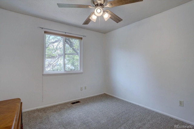 8745 W Ottawa Ave, Littleton, CO 80128 - empty room with carpet floors, a ceiling fan, and baseboards