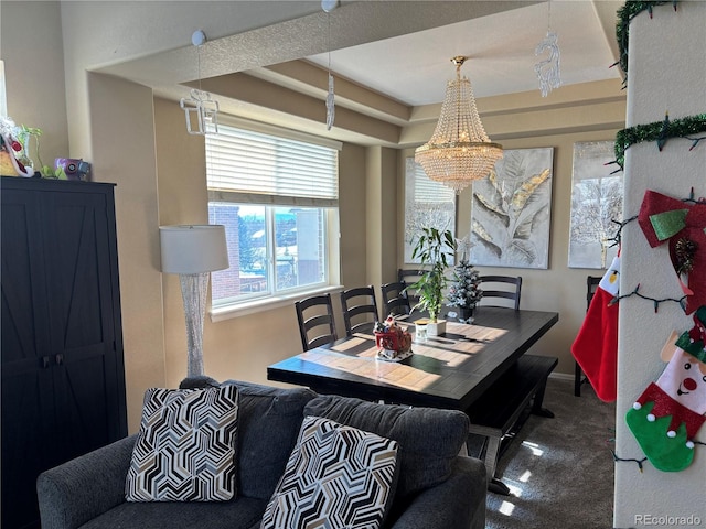 view of carpeted dining space