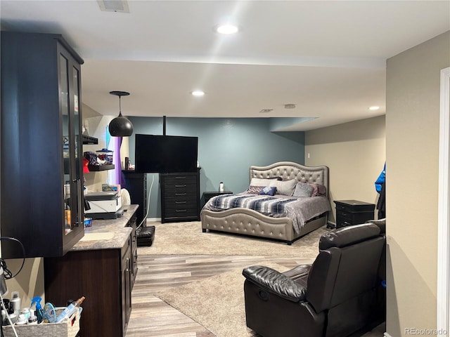 bedroom featuring light wood-type flooring