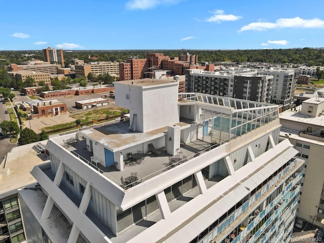 birds eye view of property with a city view