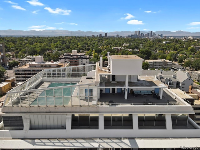 bird's eye view with a view of city and a mountain view