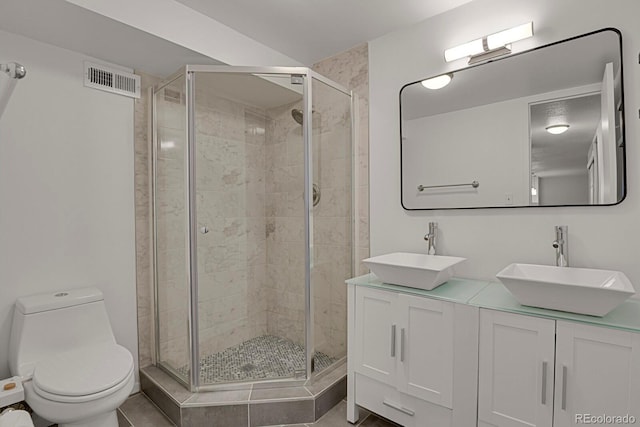 full bath featuring a sink, visible vents, and a shower stall