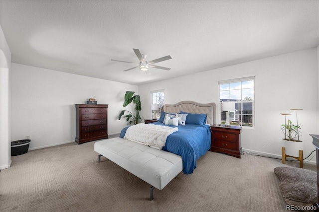 2153 Mountain Iris Dr, Erie, CO 80516 - bedroom with carpet, baseboards, and a ceiling fan