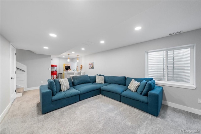 2153 Mountain Iris Dr, Erie, CO 80516 - carpeted living area with baseboards and recessed lighting