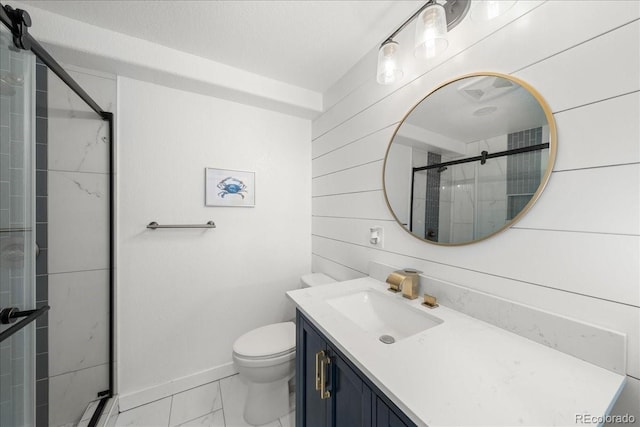 2153 Mountain Iris Dr, Erie, CO 80516 - full bath with a stall shower, marble look tiles, vanity, toilet, and baseboards