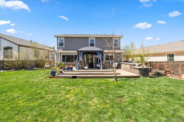 2153 Mountain Iris Dr, Erie, CO 80516 - rear view of property with a gazebo and a deck