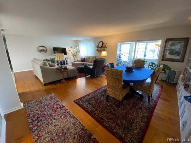 dining space featuring wood finished floors