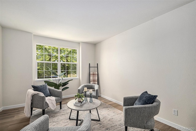 11868 W Progress Ave, Littleton, CO 80127 - sitting room featuring wood finished floors and baseboards