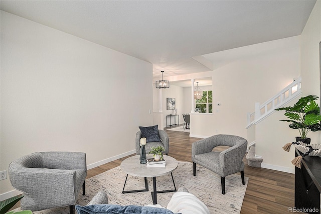 11868 W Progress Ave, Littleton, CO 80127 - sitting room with a chandelier and wood finished floors