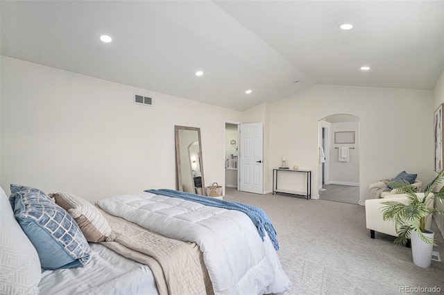 11868 W Progress Ave, Littleton, CO 80127 - carpeted bedroom with arched walkways, vaulted ceiling, and recessed lighting