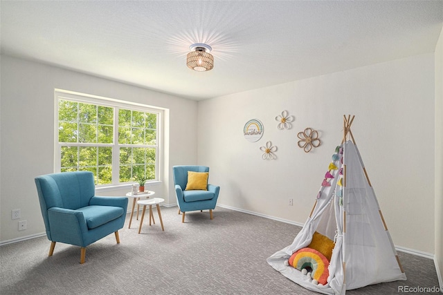 11868 W Progress Ave, Littleton, CO 80127 - recreation room with carpet flooring and baseboards