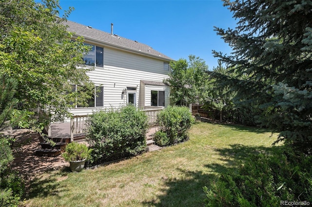 11868 W Progress Ave, Littleton, CO 80127 - view of grassy yard with a wooden deck