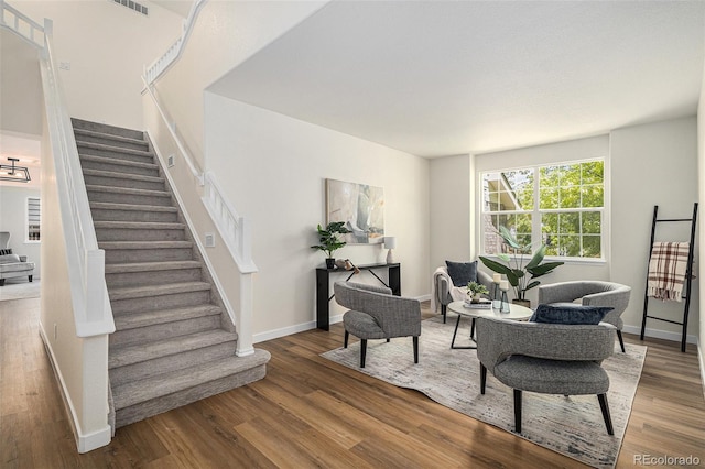 11868 W Progress Ave, Littleton, CO 80127 - living room featuring stairway and wood finished floors
