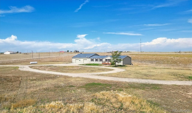 view of yard featuring a rural view