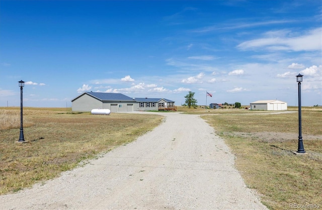 43343 E Arkansas Pl, Bennett, CO 80102 - view of dirt / gravel road with street lighting