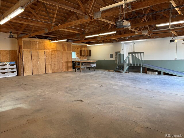 43343 E Arkansas Pl, Bennett, CO 80102 - garage featuring a garage door opener
