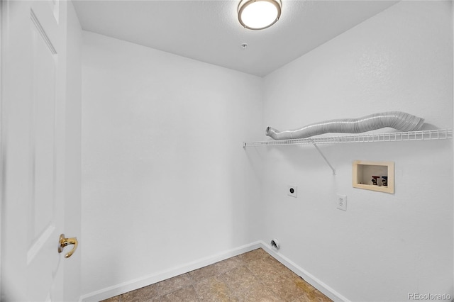 laundry room with hookup for a washing machine, electric dryer hookup, and tile patterned floors