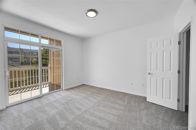 empty room with carpet flooring