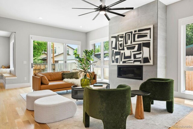 1500 S Elizabeth St, Denver, CO 80210 - living area with plenty of natural light, wood finished floors, ceiling fan, and recessed lighting