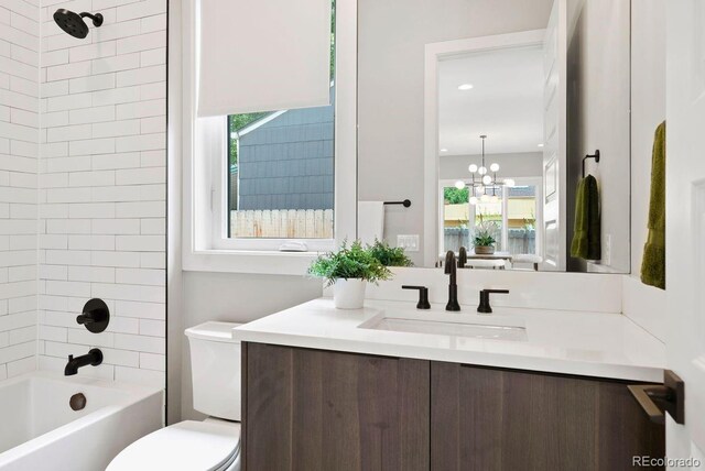 1500 S Elizabeth St, Denver, CO 80210 - full bath with vanity, toilet, bathing tub / shower combination, a chandelier, and recessed lighting