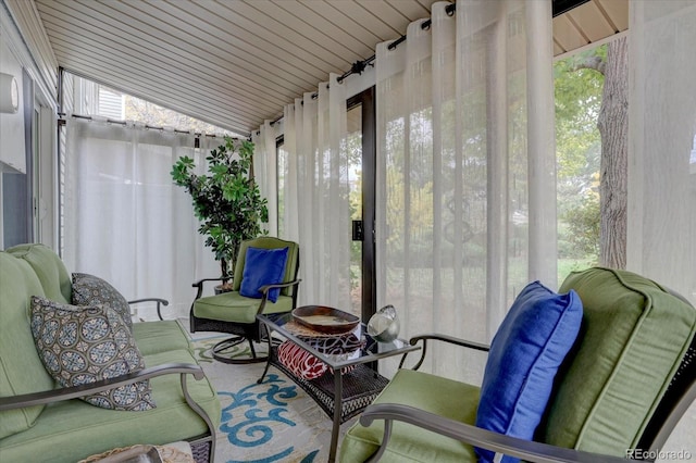 sunroom / solarium with vaulted ceiling and wooden ceiling