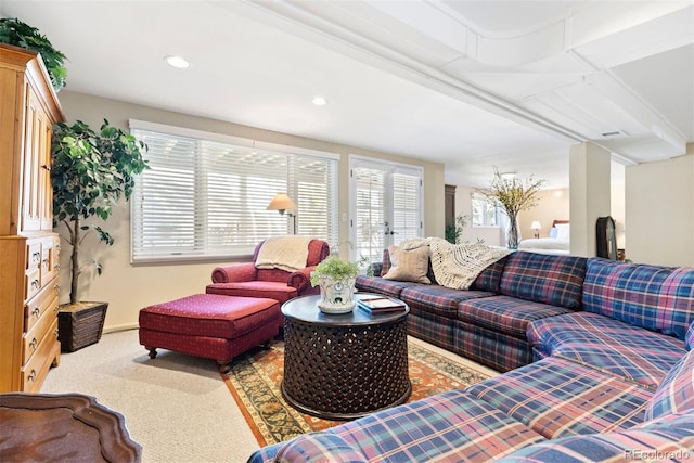 carpeted living room with recessed lighting