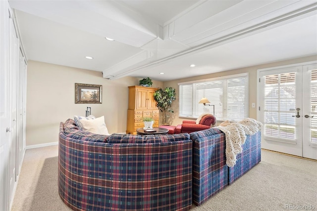 living area with recessed lighting, french doors, light carpet, and baseboards