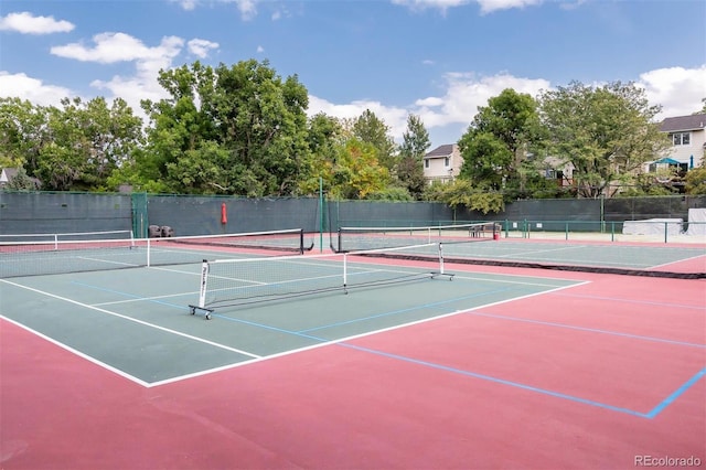 view of sport court with fence