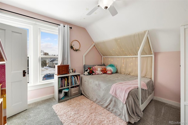 carpeted bedroom with lofted ceiling and ceiling fan