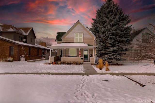 view of front of property featuring covered porch