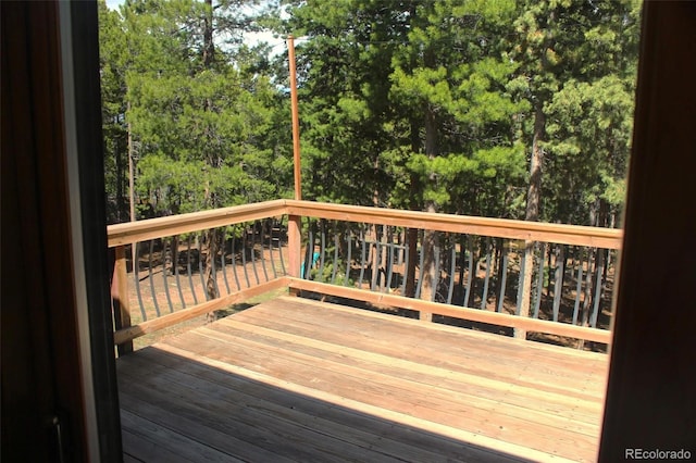 9274 Sandy Ln, Conifer, CO 80433 - view of wooden deck