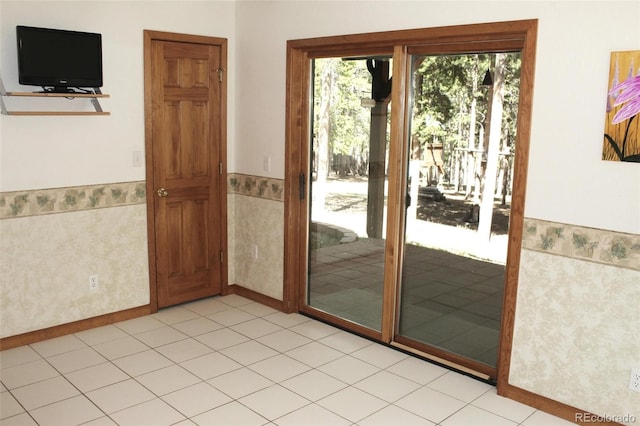 9274 Sandy Ln, Conifer, CO 80433 - doorway featuring wainscoting