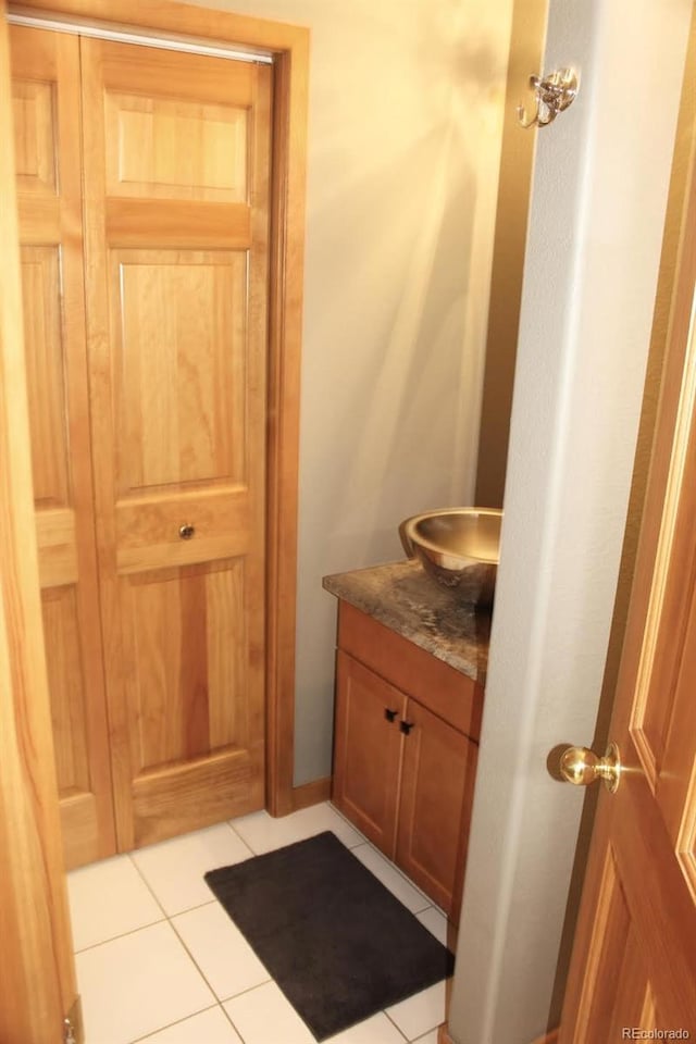 9274 Sandy Ln, Conifer, CO 80433 - bathroom featuring vanity and tile patterned flooring