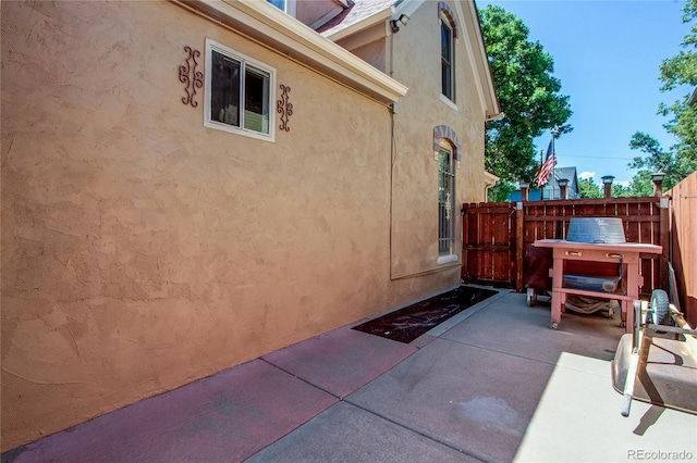 view of home's exterior featuring a patio