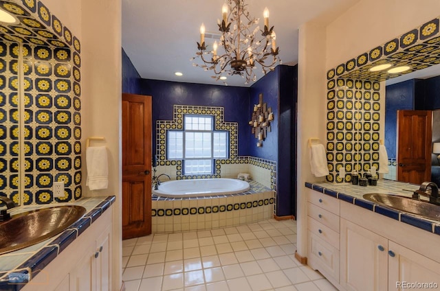 7022 Secrest Ct, Arvada, CO 80007 - bathroom with a notable chandelier, a garden tub, tile patterned flooring, and a sink