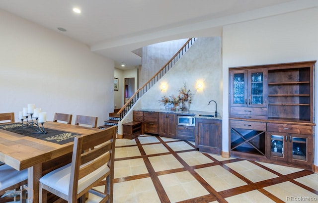 7022 Secrest Ct, Arvada, CO 80007 - dining area featuring stairway and recessed lighting