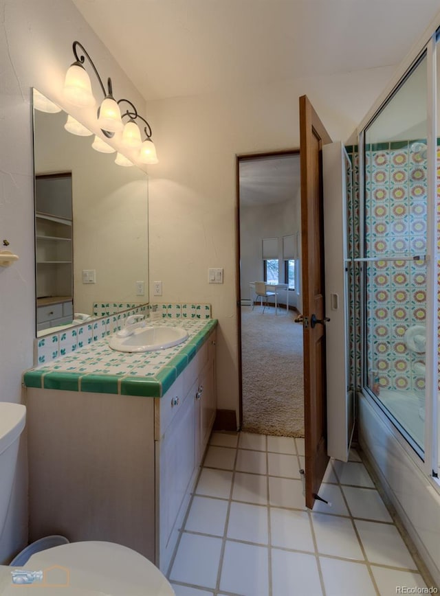 7022 Secrest Ct, Arvada, CO 80007 - full bathroom featuring vanity, toilet, and shower / bathtub combination