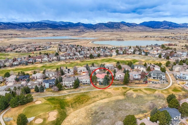 7022 Secrest Ct, Arvada, CO 80007 - bird's eye view with a water and mountain view, view of golf course, and a residential view