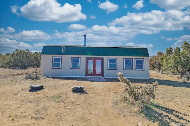 4178 County Road 504, Walsenburg, CO 81089 - view of front of property with metal roof, french doors, and a fire pit