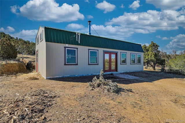 4178 County Road 504, Walsenburg, CO 81089 - view of front facade with french doors, a gambrel roof, and metal roof