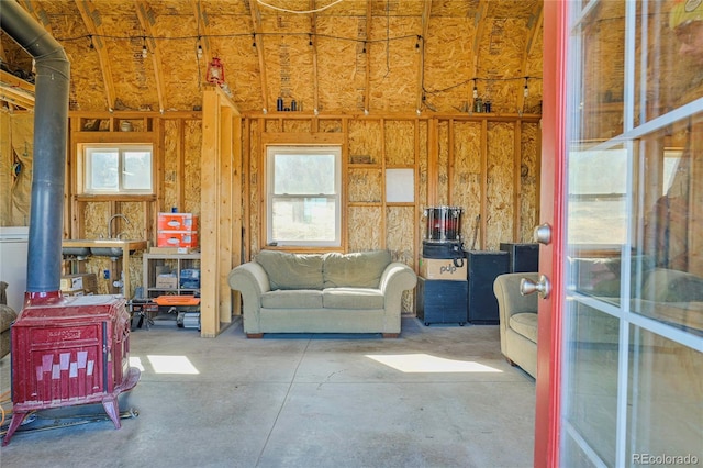 4178 County Road 504, Walsenburg, CO 81089 - interior space with concrete floors and a wood stove