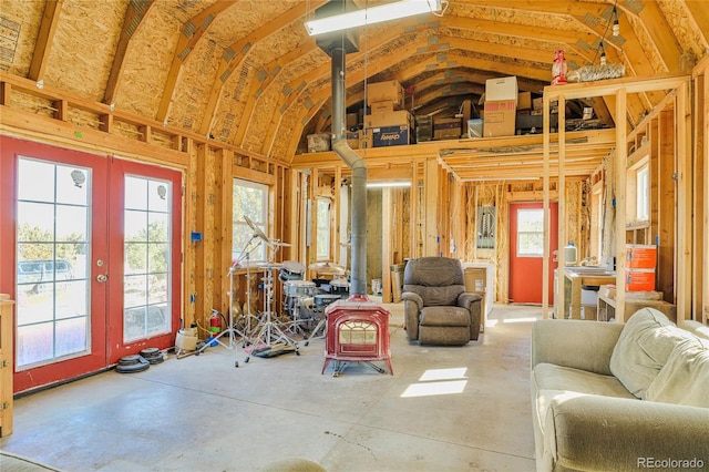 4178 County Road 504, Walsenburg, CO 81089 - living area with french doors, a wood stove, and lofted ceiling