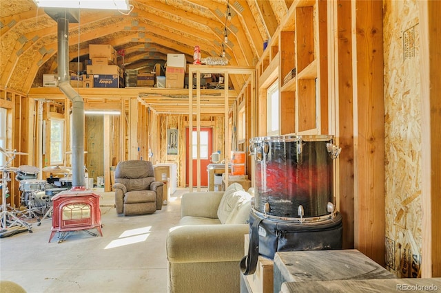 4178 County Road 504, Walsenburg, CO 81089 - interior space with a wood stove and vaulted ceiling