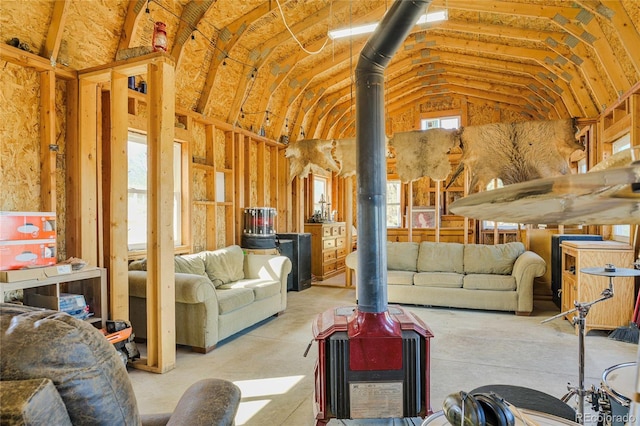 4178 County Road 504, Walsenburg, CO 81089 - living area with a wood stove and lofted ceiling