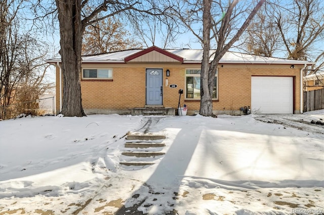 single story home featuring a garage