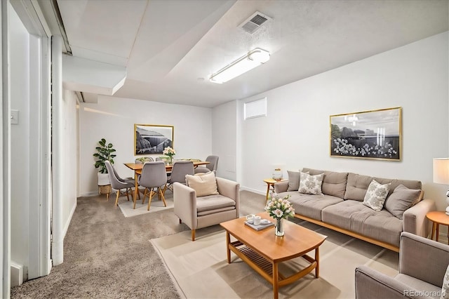 living room featuring light colored carpet